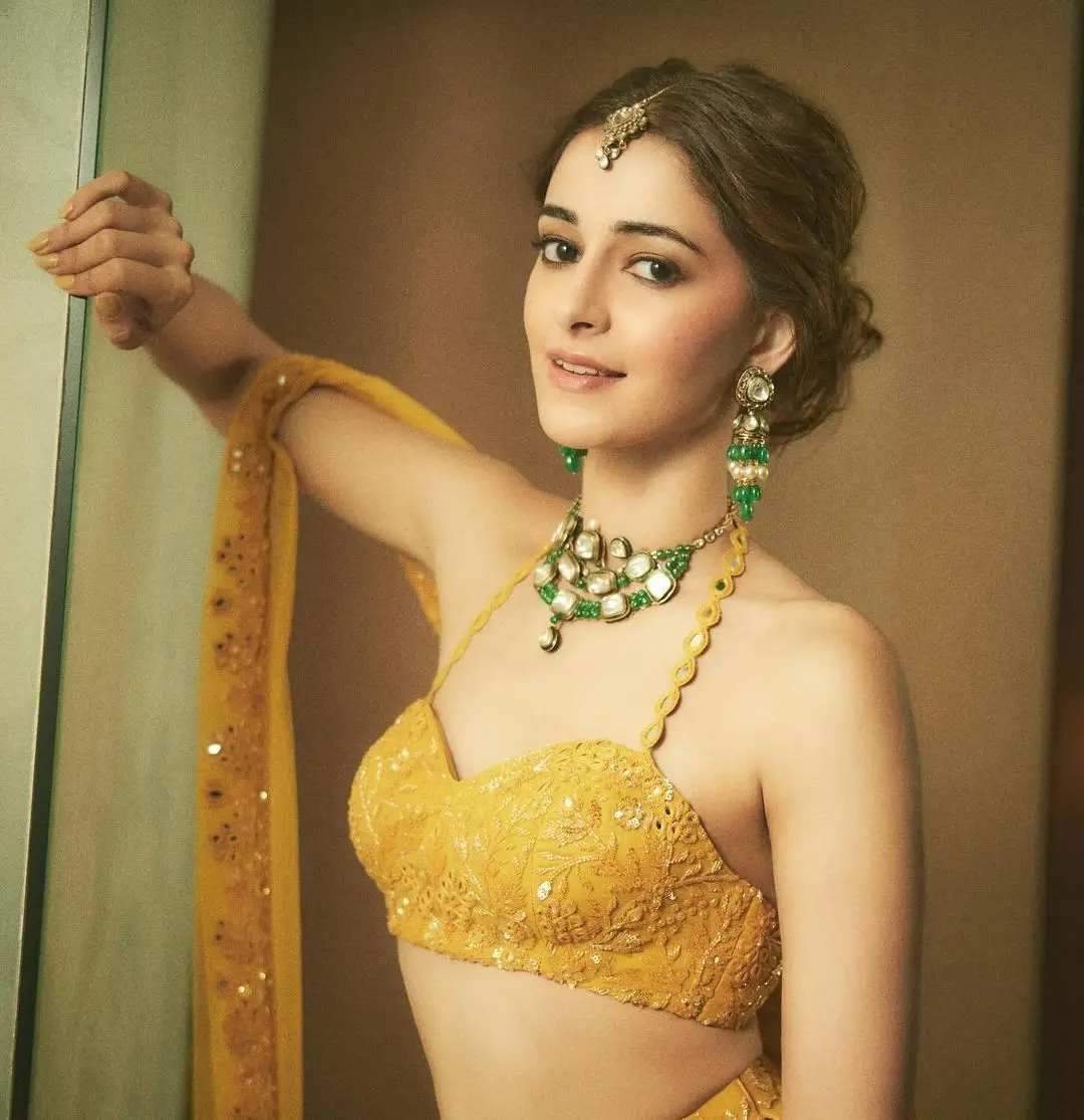 HINDI ACTRESS ANANYA PANDAY IN SLEEVELESS YELLOW LEHENGA CHOLI